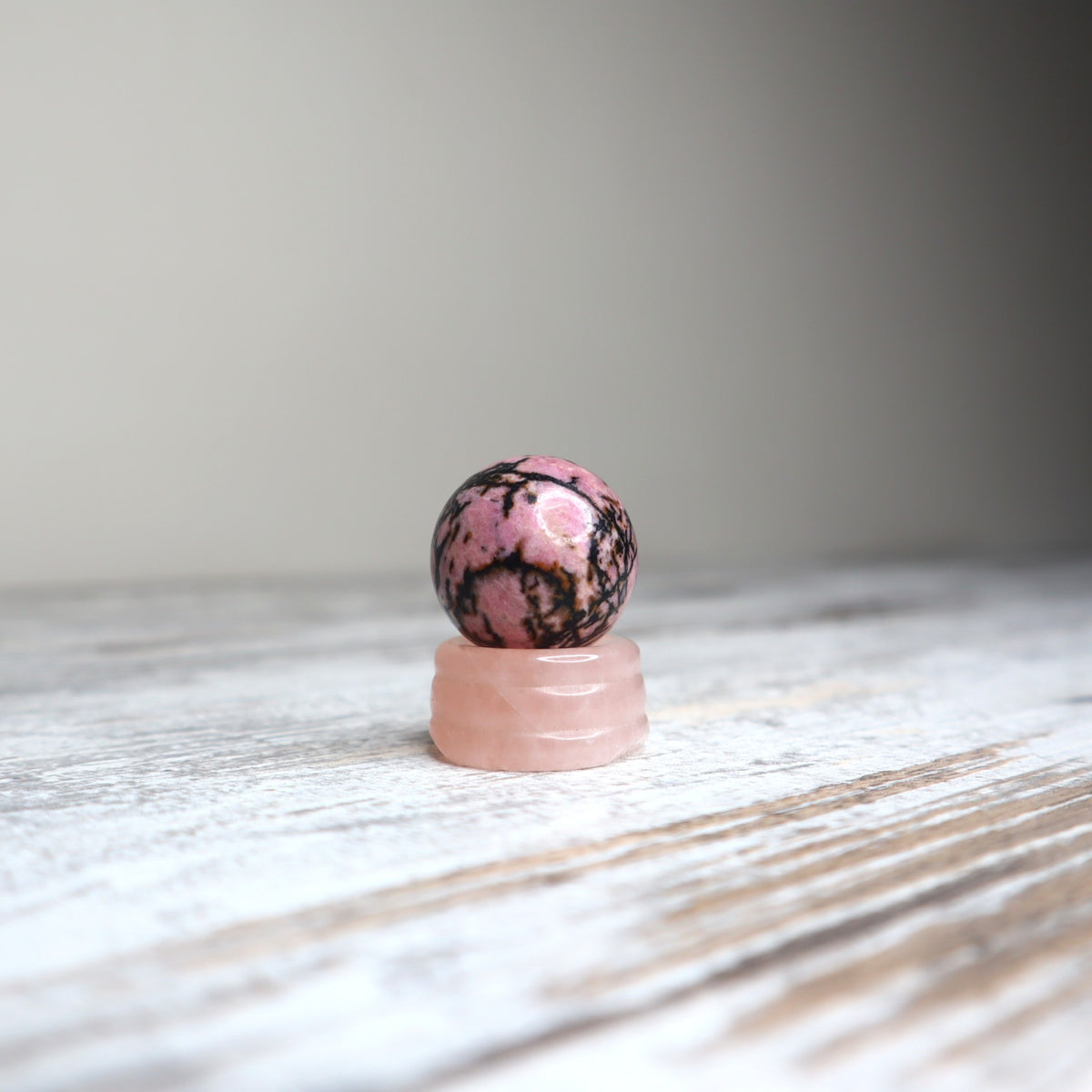 Rhodonite Mini Sphere on Rose Quartz Stand