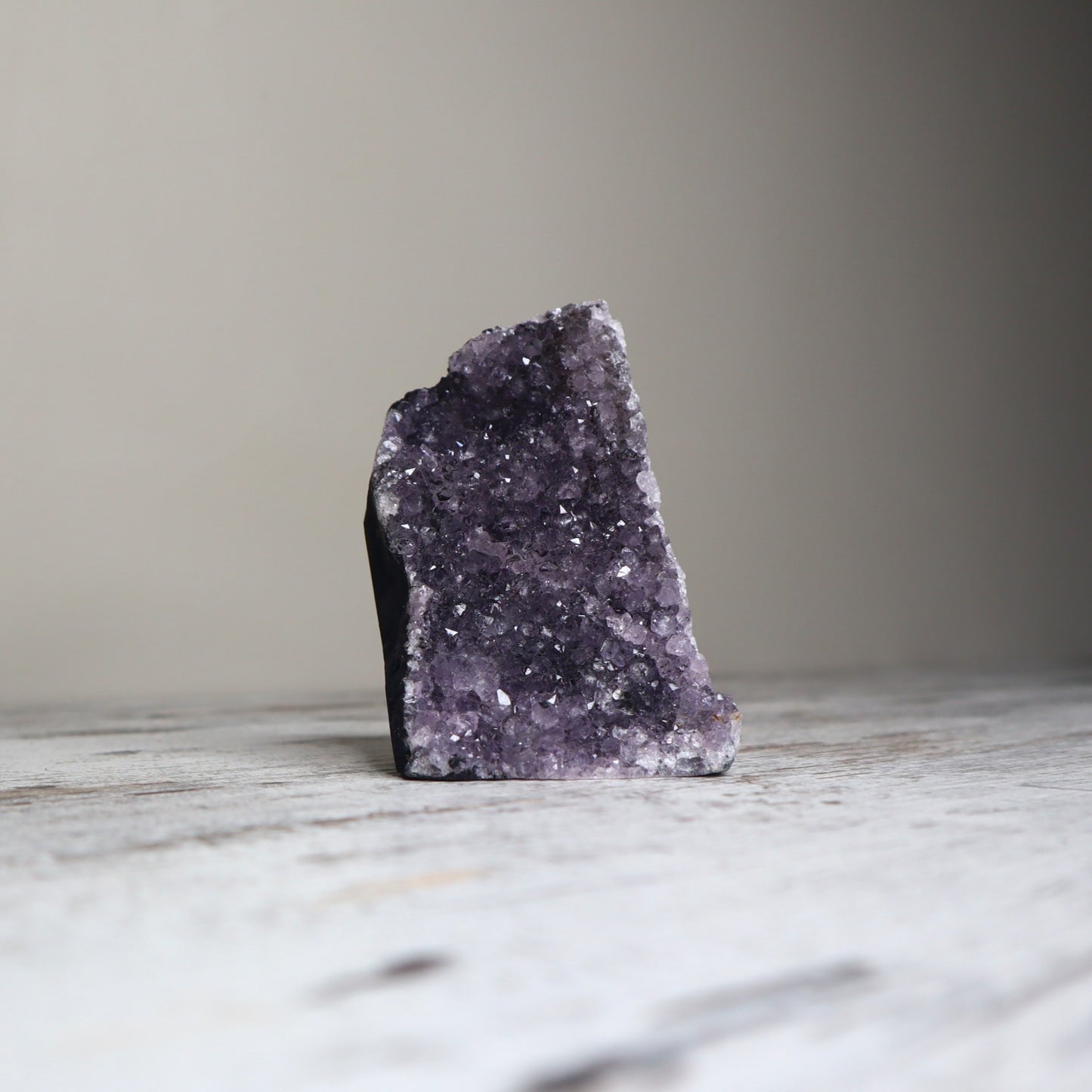 Purple amethyst cut base crystal with sparkling druzy for calm and clarity.