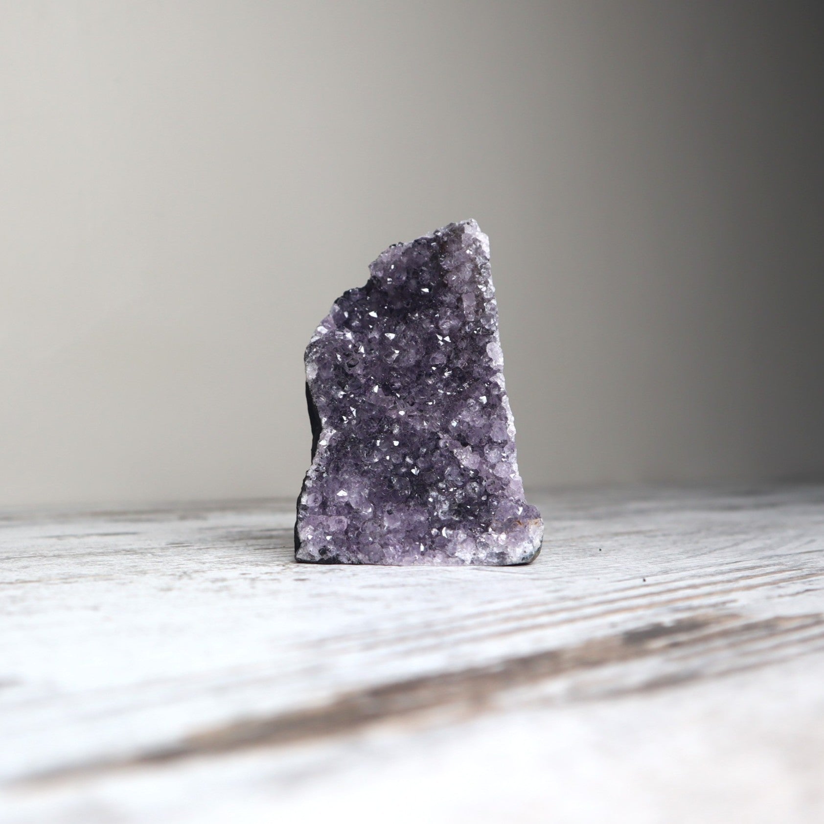 Purple amethyst cut base crystal with sparkling druzy for clarity and spiritual insight.