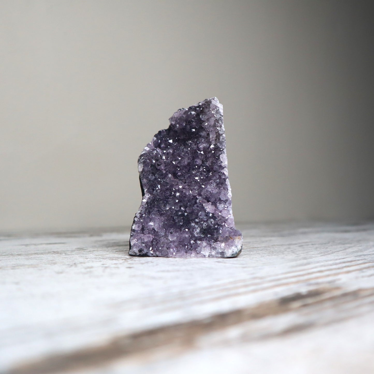 Purple amethyst cut base crystal with sparkling druzy for calm, clarity and connection.