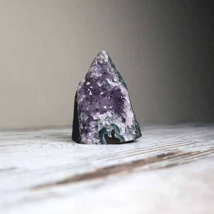 Amethyst cut-base cluster with deep purple crystal points.