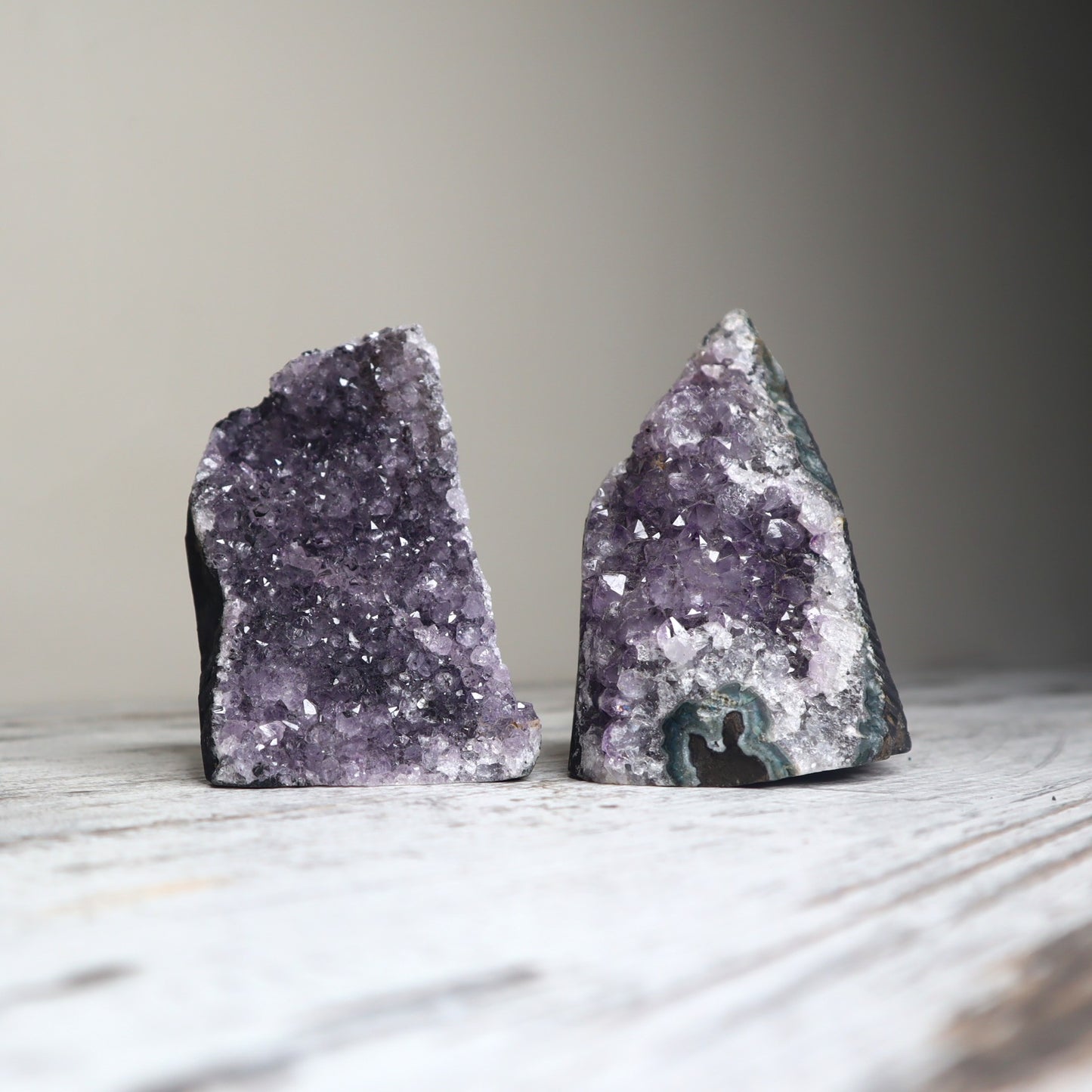 Purple amethyst cut base crystal with sparkling druzy for energetic healing and spiritual connection.