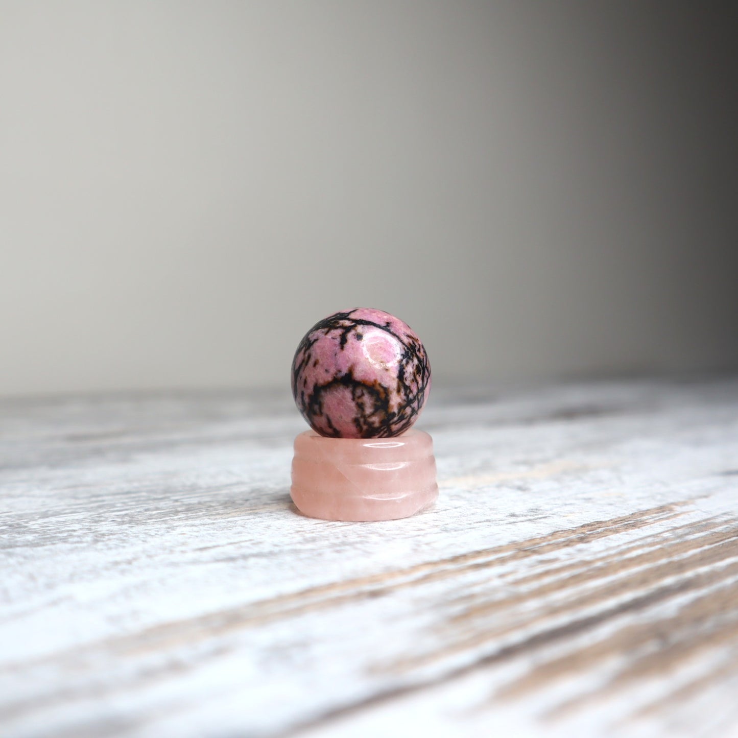 Rhodonite Mini Sphere on Rose Quartz Stand