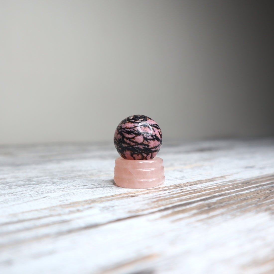 Rhodonite Mini Sphere on Rose Quartz Stand