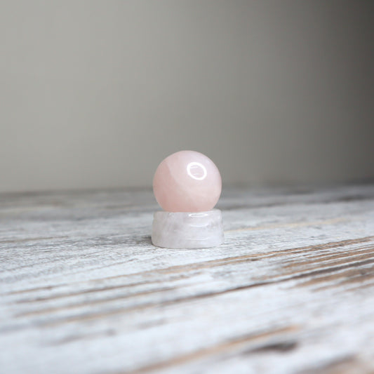 Rose Quartz Mini Sphere on Quartz Stand