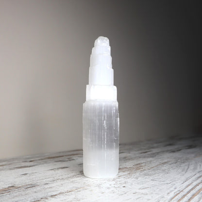 Selenite skyscraper-style crystal used for aura purification.